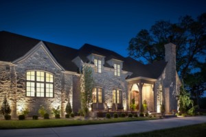 Exterior of luxury home with custom lighting