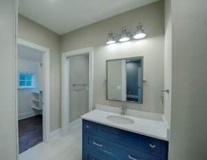 Custom bathroom vanity with overhead lighting