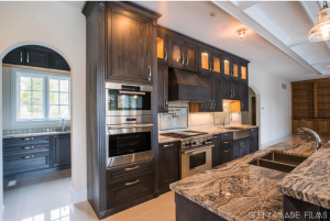 Gourmet kitchen with expansive, custom countertops