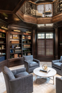 Traditional library with vaulted ceilings