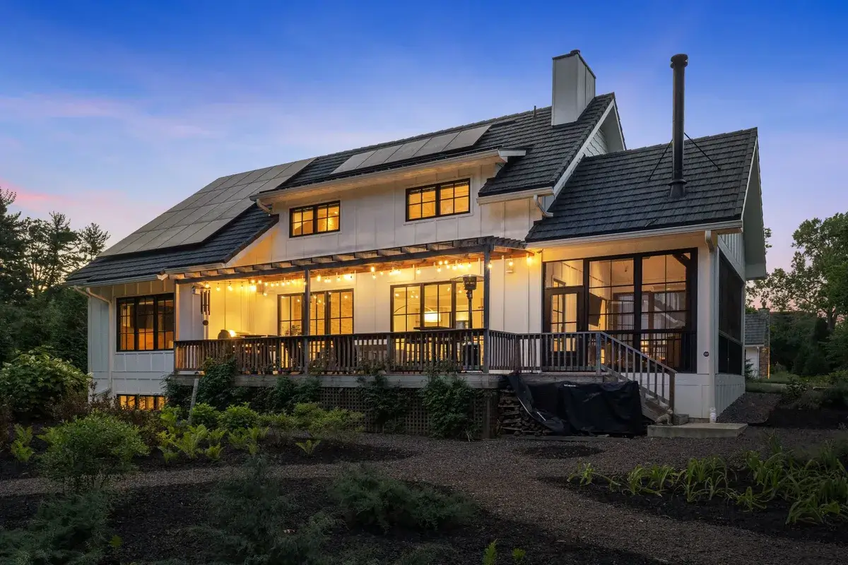 Large custom modern farmhouse featuring porch